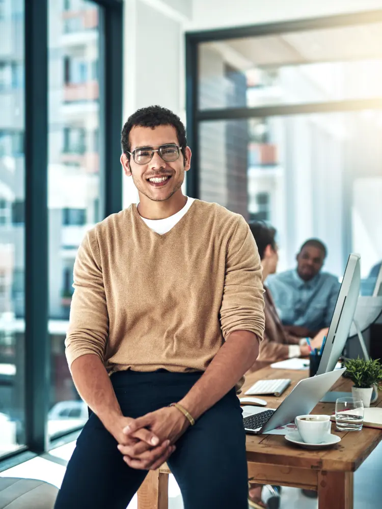 shot of a designer posing in the office with colle 2025 04 06 08 43 02 utc